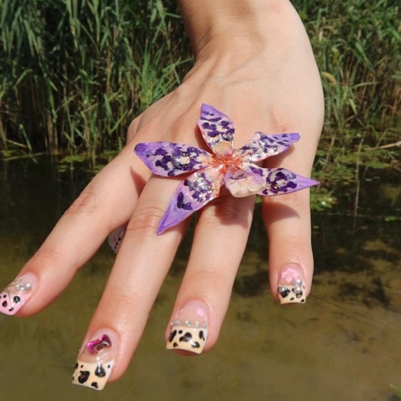 Tiger Orchid in purple ring